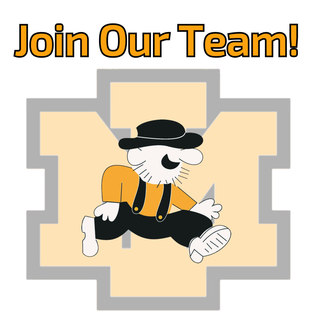 Graphic with the text "Join Our Team!" in large, bold orange letters with a black outline at the top. Below the text is a stylized gray and light orange "IM" block letter logo for Iron Mountain. Layered over the logo is a cartoon mascot of a Mountaineer with a white face, stubble beard, and a wide grin, wearing a black hat, an orange shirt, black trousers with suspenders, and white shoes, depicted in a running or striding pose.